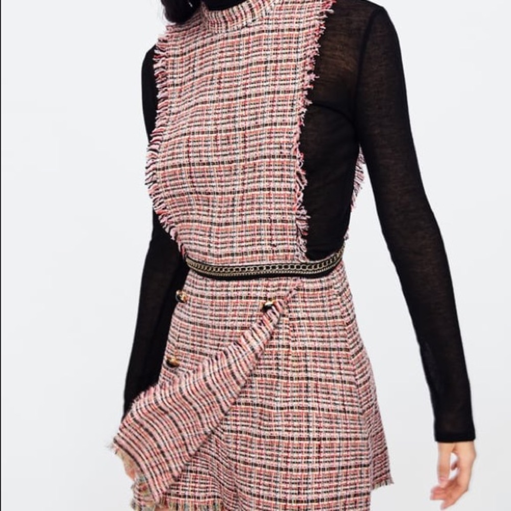 Zara—Tweed jumpsuit with chain.